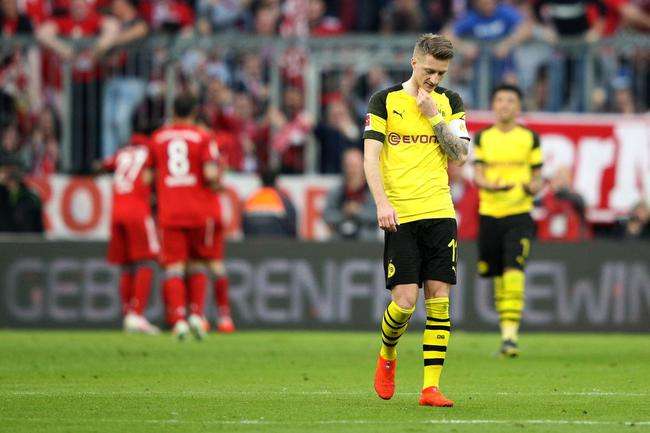  拜仁客场逆转击败多特蒙德,锁定德甲榜首  